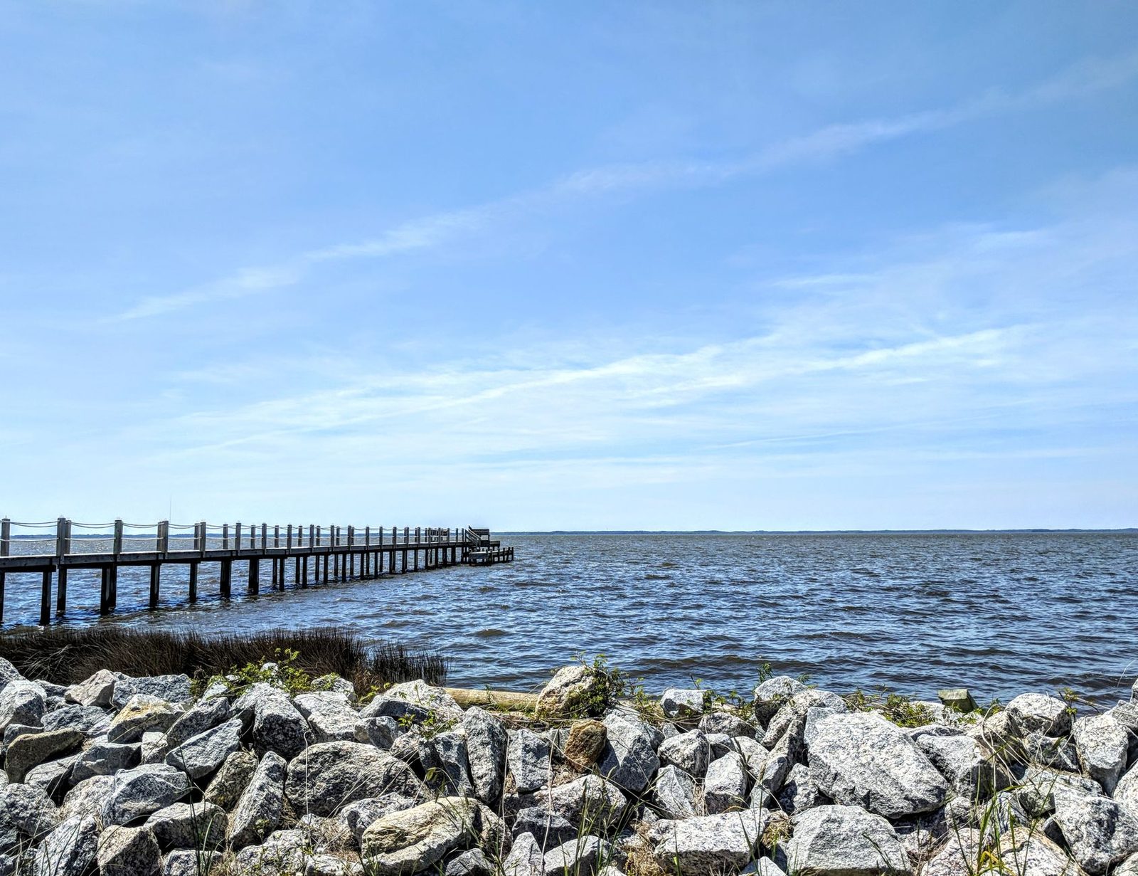A long pier and rocky shore at Kinnakeet on the North Carolina coast